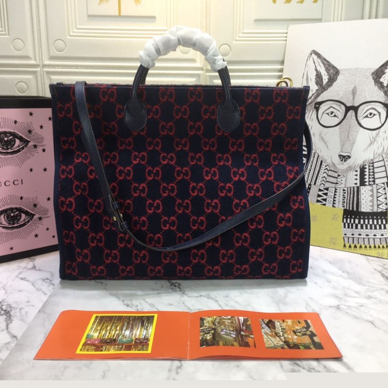 G*u*i shopping bags